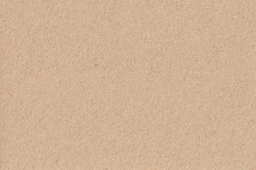 High detail carton background and texture brown paper sheet. Beige recycled eco carton paper or cardboard background.
