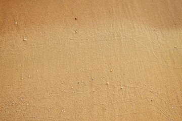 sea water and sand on the shore. View from above.