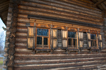 Fototapeta na wymiar Window decorations in russian hut, Vitoslavitsy, Novgorod region, Russia