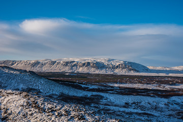 Arctic landscape in Iceland with snow covered mountains 