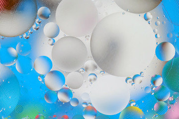 abstract background colored circles of oil on water