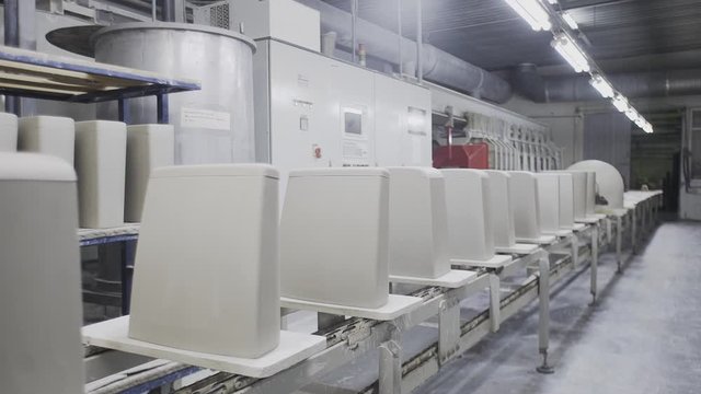 Production of ceramics, view of ceramic products sinks and toilets, conveyor.