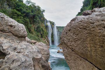 River and amazing crystalline blue water of Tamul waterfall in San Luis Potosí, Mexico