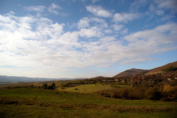 Obraz premium landscape with green field and blue sky