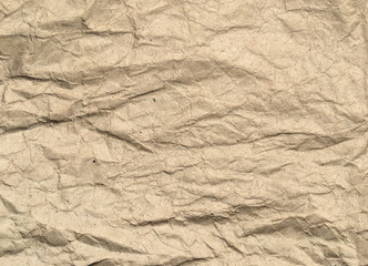 Brown crumpled paper background with copy space for Design. Wrinkled wallpaper Pattern