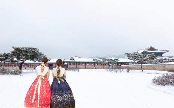 Gyeongbokgung Palace In Winter With Korean National Dress Seoul South Korea