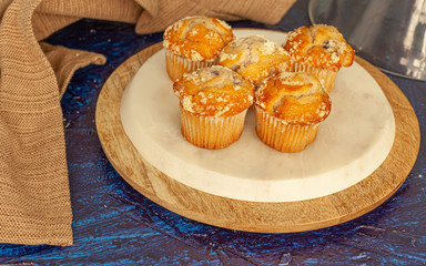 blueberry muffins on the table