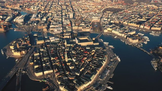 STOCKHOLM, SWEDEN - FEBRUARY, 2020: Aerial view of Stockholm city centre Gamla stan. Flying over buildings in old town.