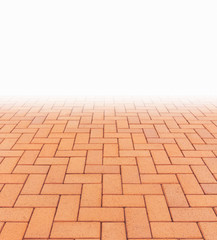 Paver brick floor also call brick paving, paving stone or block paving. Manufactured from concrete or stone for road, path, driveway and patio. Empty floor in perspective view for texture background.