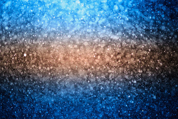 glitter bokeh of light background .Abstract blurred light.blue and gold color