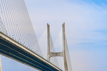 Closeup fragment of Vasco da Gama bridge, a cable stayed bridge flanked by viaducts and rangeviews that spans the Tagus River in Lisbon, Portugal