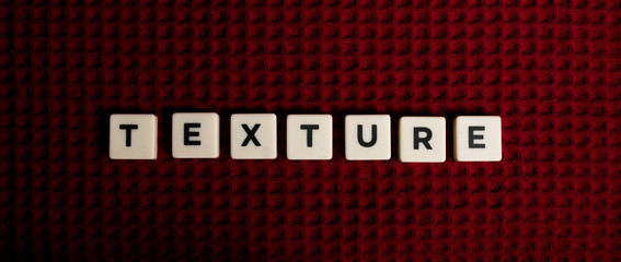 White wood tiles letters expelling texture