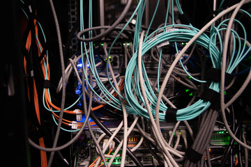 messy and tangled networking rack