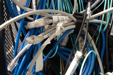 a bunch of ethernet cables tied together 