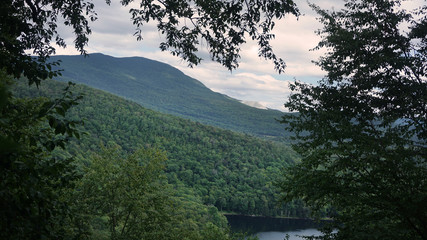 A scenic view from the Devil's Perch Overlook towards Ritterbush Pond and  Belvidere Mountain on the Long Trail in Vermont.