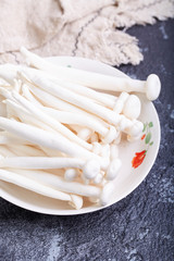 Fresh white mushrooms on a plate