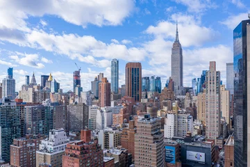 Fotobehang New York City Midtown Skyline met Empire State overdag, luchtfotografie © raoyang