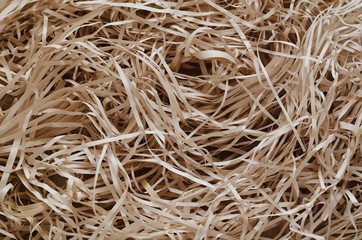 Background photo of messy chopped crafting paper.