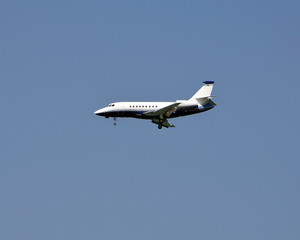 Small passenger jet aircraft preparing to land at a southeast florida airport 
