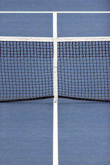 Tennis net and centre service line