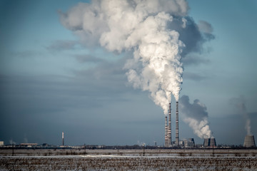 Smoke from factory chimneys pollutes the environment.