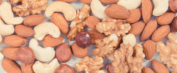Fototapeta premium Various nuts and almonds, healthy nutrition and lifestyle