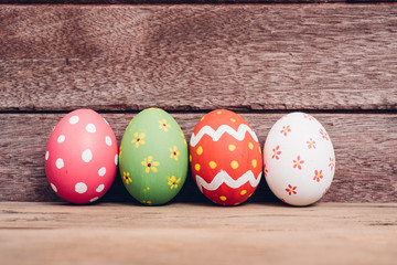 Beautiful Easter egg on wooden background