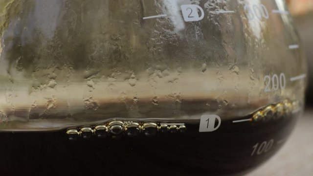 Drip coffee that is dripping into the coffee jar during the morning hours.