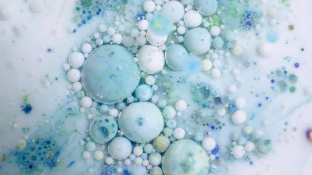 Slow motion of bright colored bubbles