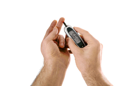 A small drop of blood obtained by piercing the skin with a lancet is placed on a disposable test strip inserted in the glucose meter, which the device reads and uses to calculate the level of glucose 