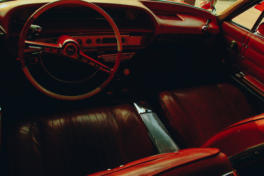 Fototapeta Vintage car interior to show a 1920's cinematic moody themed background