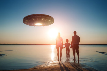 UFO, an alien plate hovering above water, hovering motionless in the air. Unidentified flying...