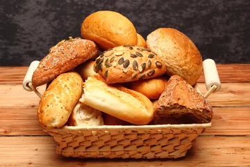 Fotobehang Assorted Rolls and Bread © Yulia