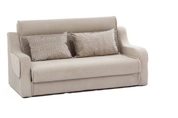 Wide view of cream colored sofa with two pillows