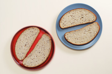 Two plates with bread