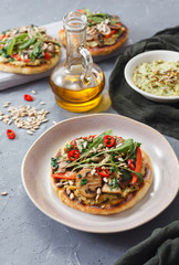 Warm, spicy Pitta, crunchy red peppers and meaty mushroom mix, parsley and sunflower seeds make this an epic toast with hummus and avocado.