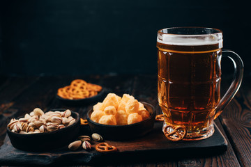 beer. refreshing light drink and salted snacks. friday party atmosphere, craft brewery, bar table. restaurant, pub, food concept.