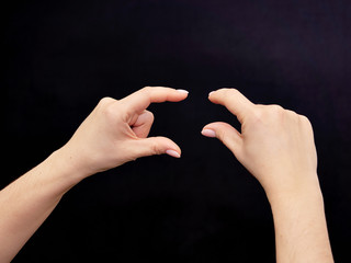 Classes in mental arithmetic,woman hands during mental score on black backgroung