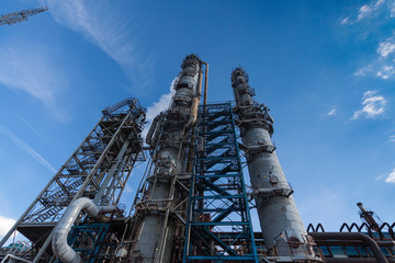 Reaction tanks at a chemical plant for the production of mineral fertilizers, nitric acid, ammonia, phosphorus fertilizers, ammonium, nitrate. In the daytime.