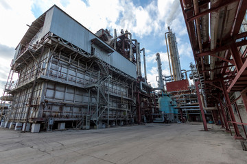 General view of the chemical furnace at a chemical enterprise producing mineral fertilizers, nitrogen, ammonia, nitric acid, phosphate fertilizers. View in the daytime, during the day.