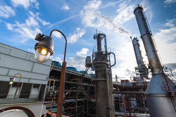 Reaction tanks at a chemical plant for the production of mineral fertilizers, nitric acid, ammonia, phosphorus fertilizers, ammonium, nitrate. In the daytime.