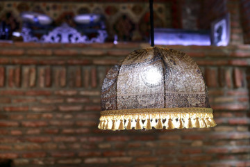 Brown lampshade with tassels