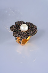Gold & Pearl made flower shape Ring isolated-