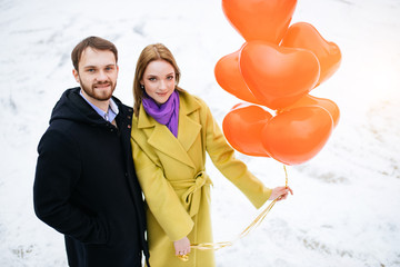 cheerful, joyfu, happy caucasian couple spend time together, man and woman in love, celebrate st...