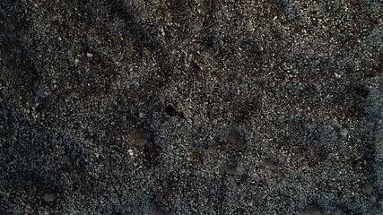 Walking through volcanic lava and contemplating the landscape