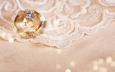 Wedding ring on the vintage lace