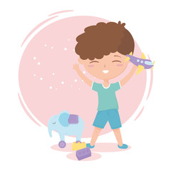 kids zone, cute little boy with plane and elephant blocks toys