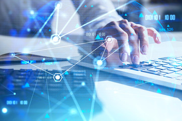 Woman typing on laptop, network interface