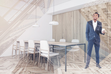 African man in white and wooden restaurant