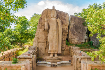 View at the Standing statue of Buddha in Avukana - Sri Lanka - obrazy, fototapety, plakaty